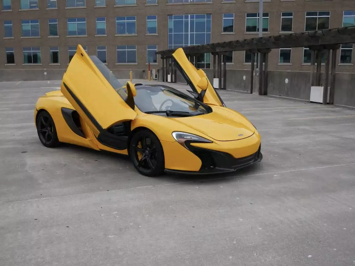 Yellow Color stunning McLaren 650s Spider available for rent at Capital Exotic car rental in DMV