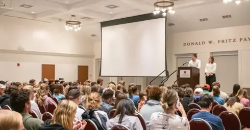 Attend A Lecture or Panel Discussion on National Holiday